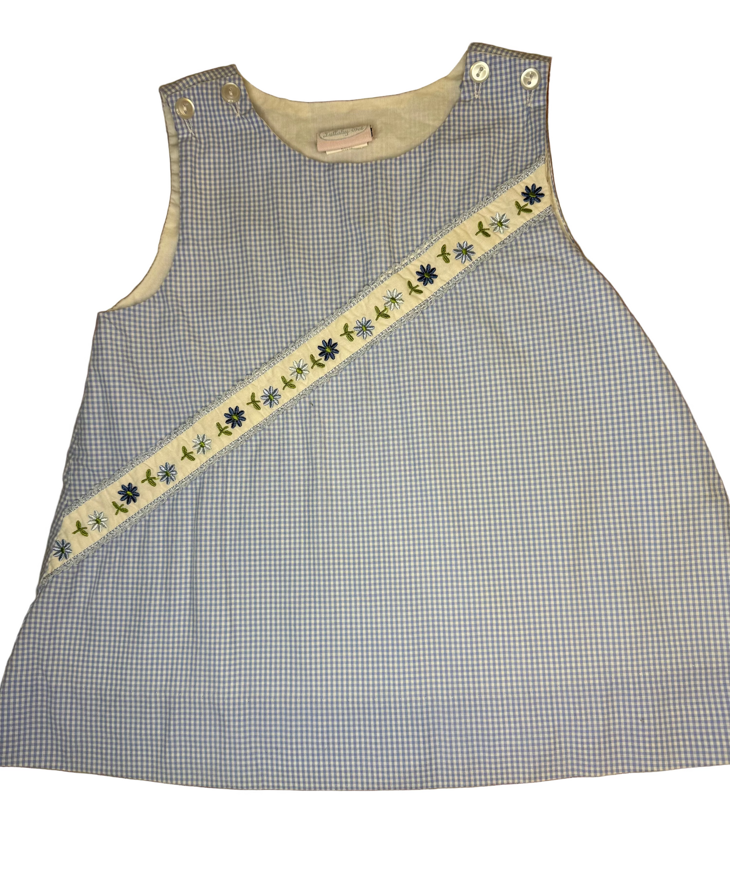 Blue gingham toddler dress with floral embroidered trim and shoulder buttons