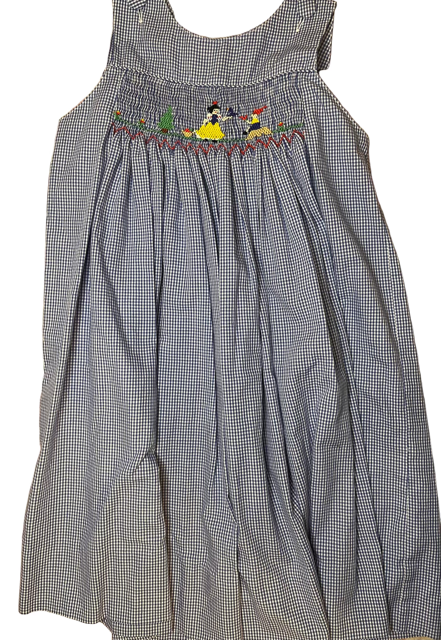 Blue gingham smocked dress for children with embroidered fairy tale characters on bodice