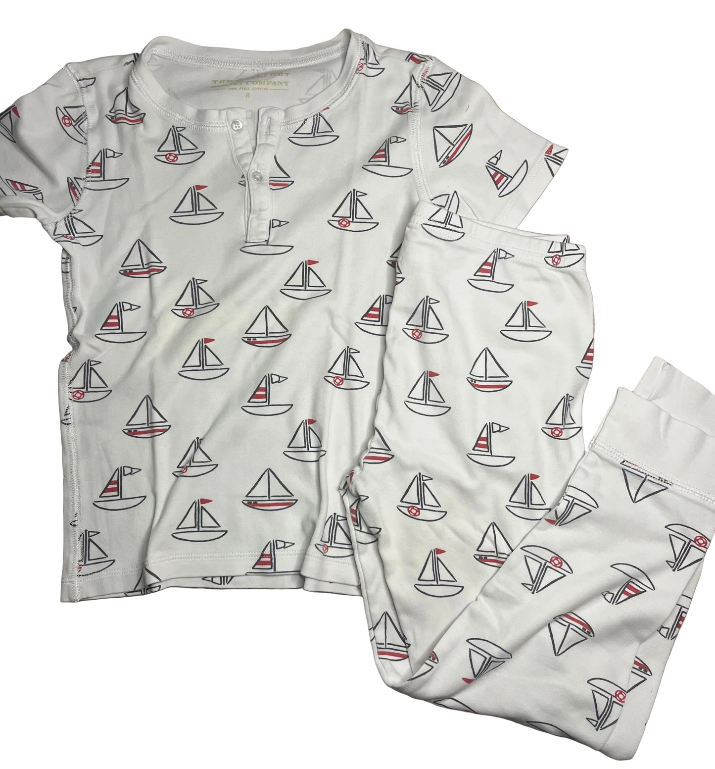 Children's white sailboat print pajama set with short-sleeve top and matching pants