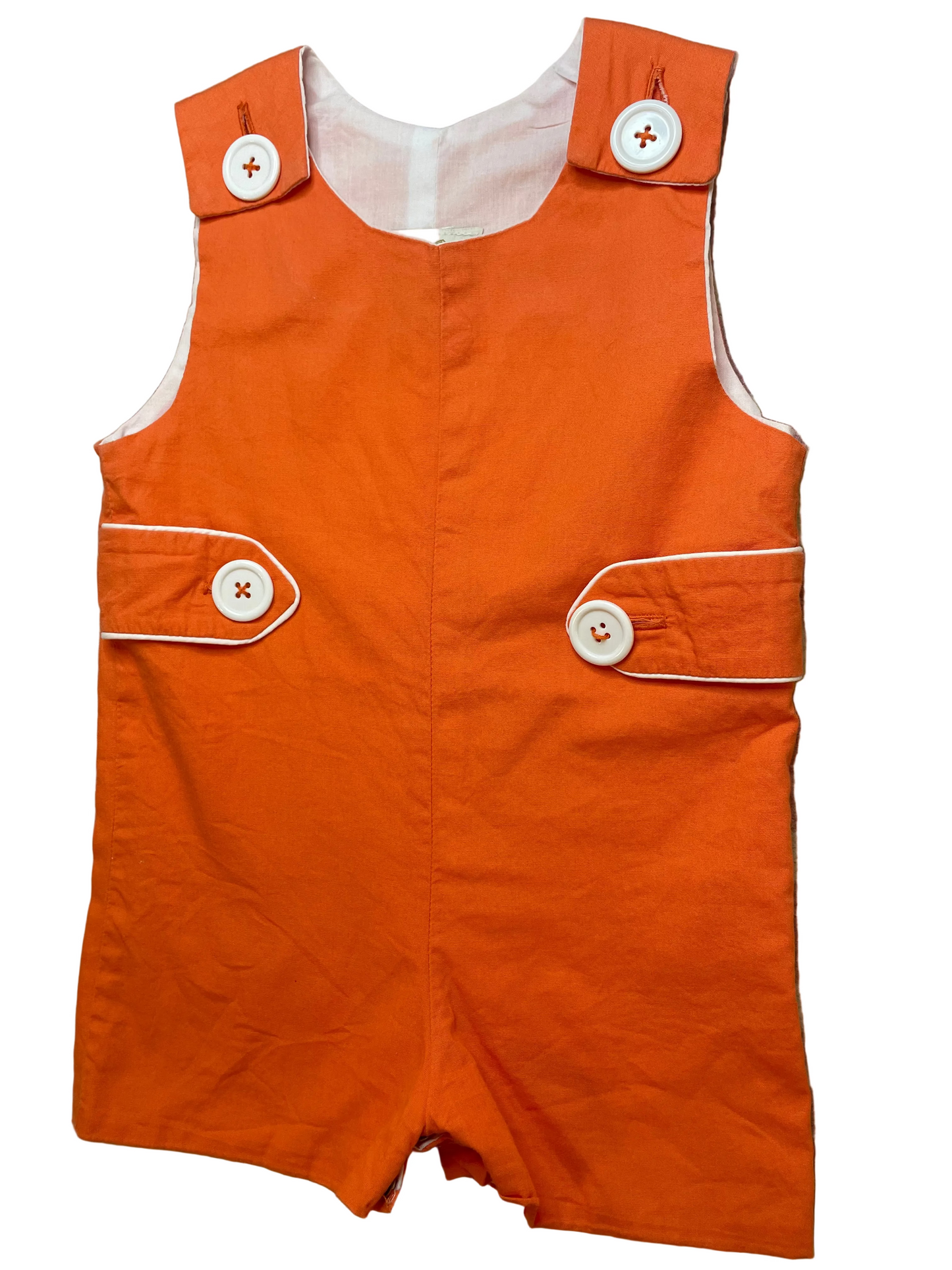 Orange toddler romper with white buttons and white trim, sleeveless baby outfit