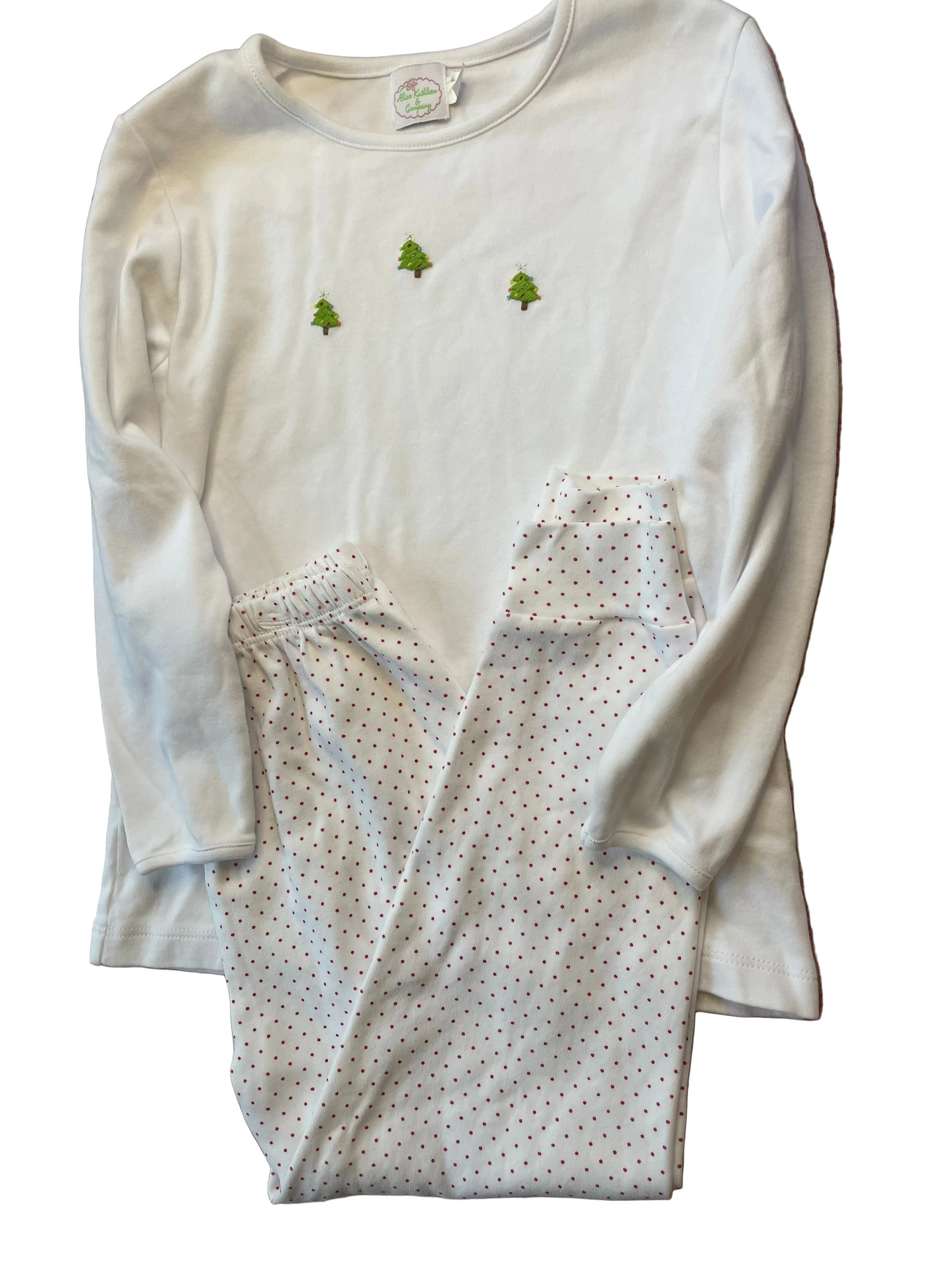 White children's Christmas pajama set with embroidered trees and red polka dot pants