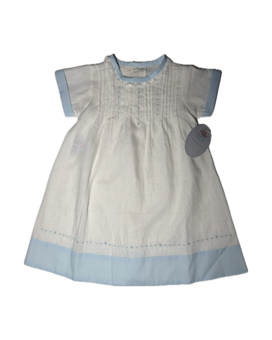 Classic white baby dress with light blue trim, short sleeves, and delicate embroidered details