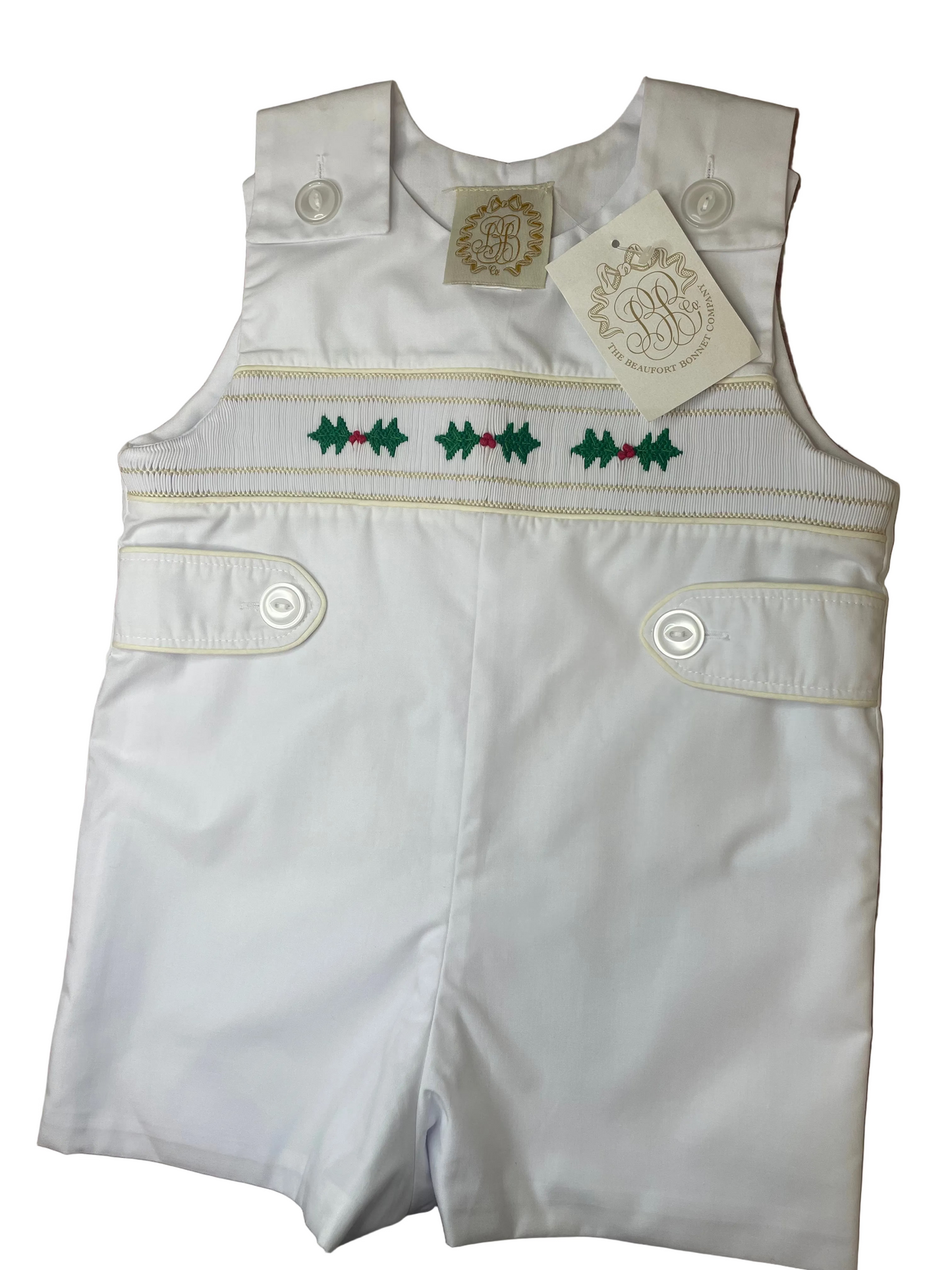 White smocked baby boy romper with holly embroidery, sleeveless, button shoulder straps