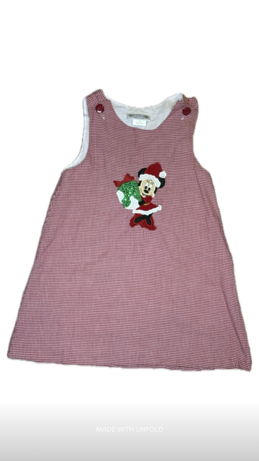 Red gingham sleeveless toddler dress with festive cartoon character applique and Christmas design