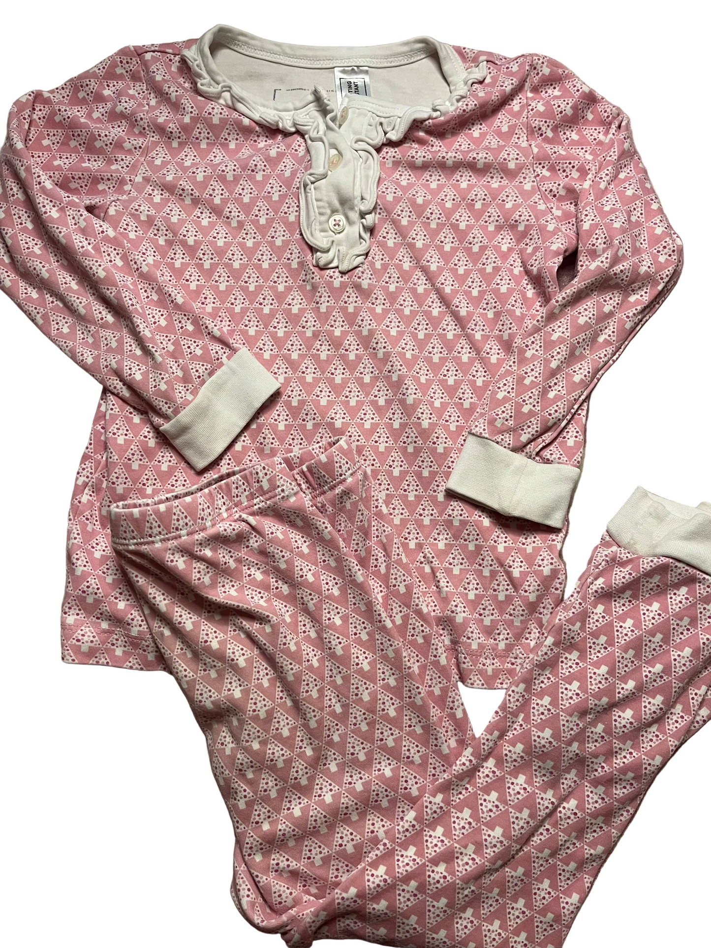 Pink and white girls' pajama set with geometric pattern and ruffle collar
