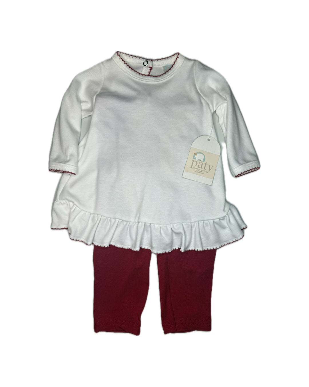 White long sleeve baby top with red trim, ruffle hem, and matching maroon leggings set
