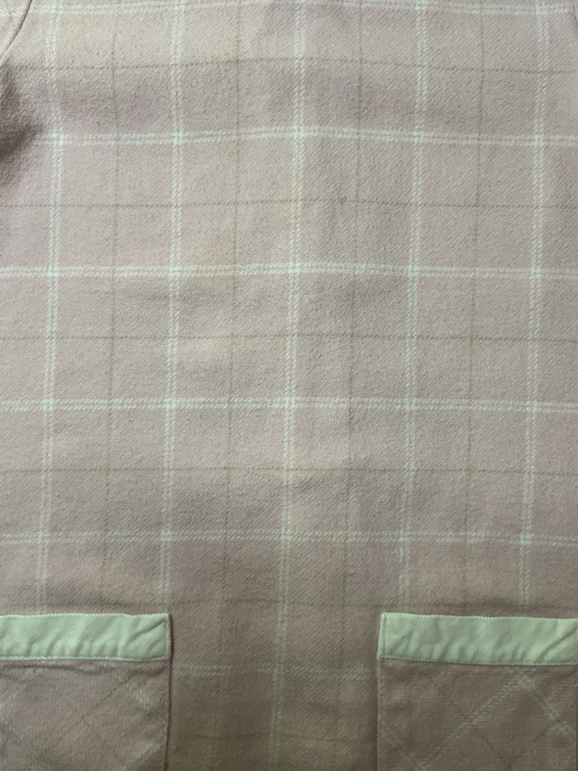 Light pink plaid children's dress fabric with two front pockets