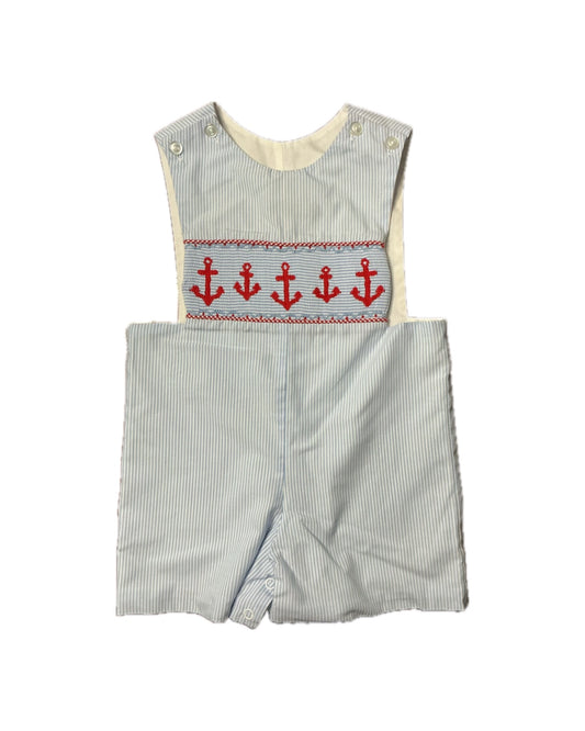 Striped blue toddler romper with red anchor smocking, nautical boys' outfit.