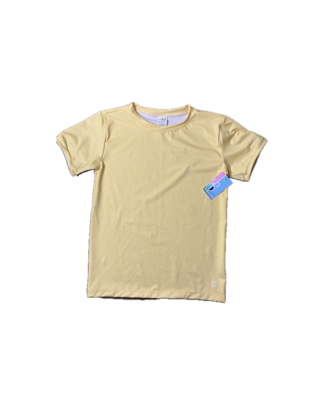 Short sleeve light yellow children's t-shirt with tag on white background