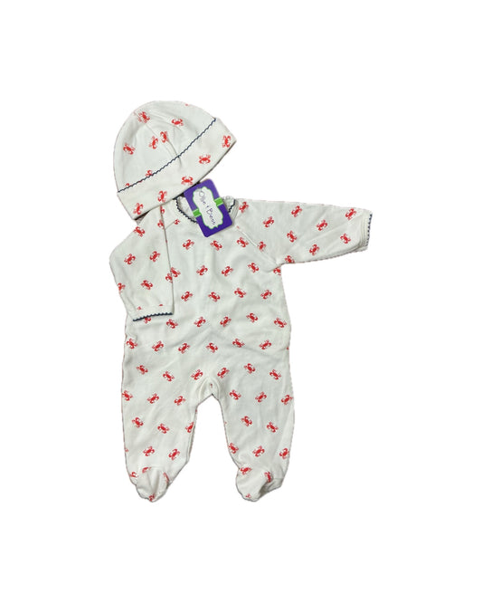 White infant romper and hat set with red crab print and scalloped trim
