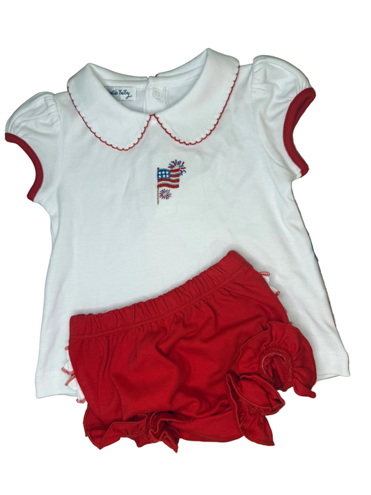 White baby girl shirt with American flag embroidery and red ruffle shorts set