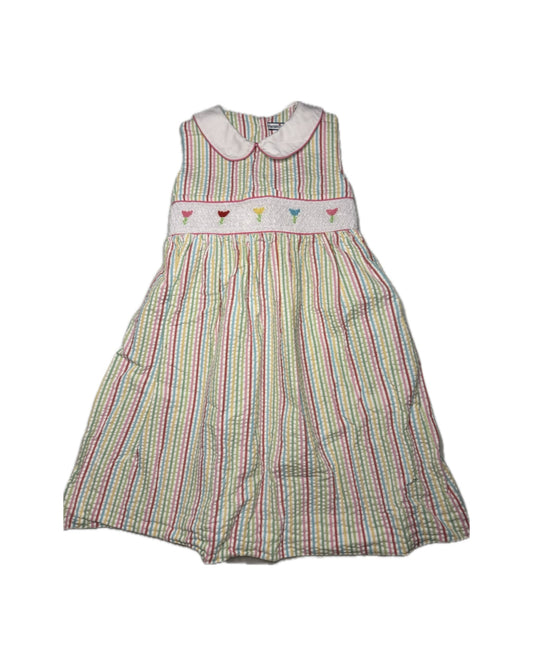 Striped dress with colorful trim on a white background