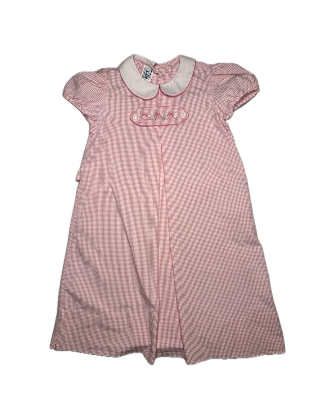 Pink checkered dress with white collar on a white background