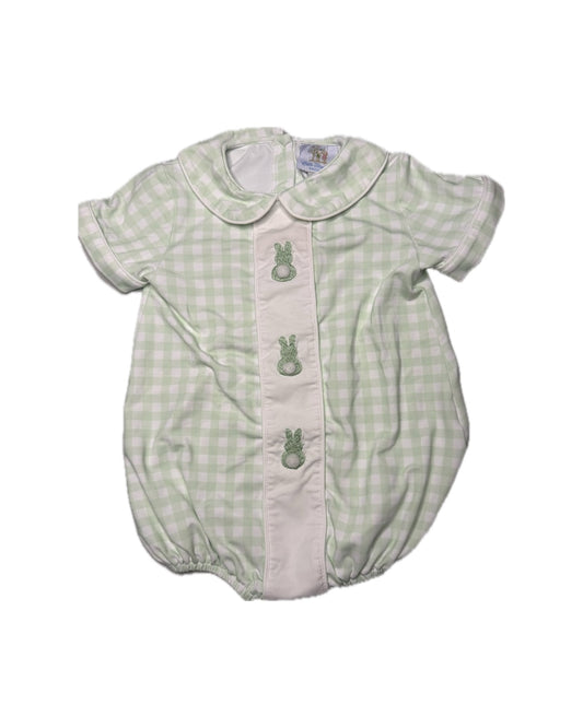Green checkered baby romper with bunny buttons on a white background