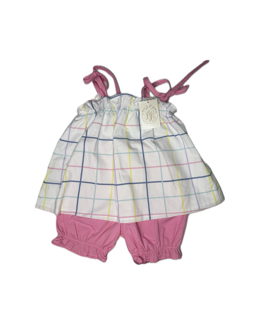 Baby outfit with checkered top and pink bloomers on a white background