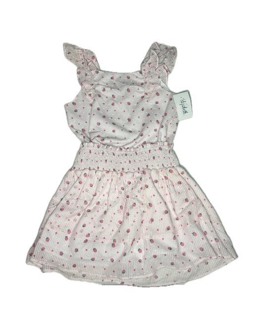 White dress with red floral pattern on a white background