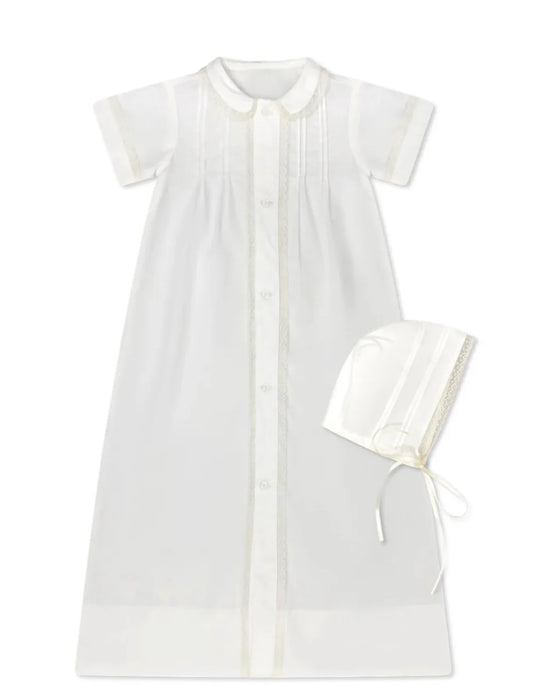 White infant christening gown with short sleeves and matching bonnet, classic children's clothing