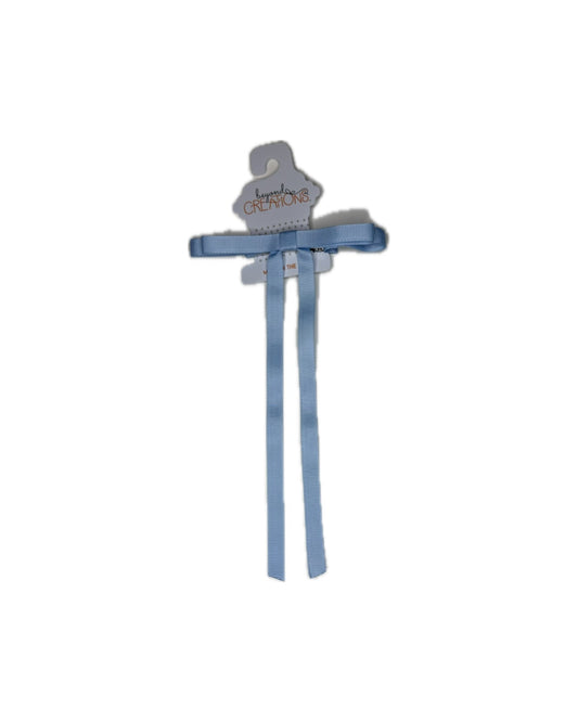 Light blue grosgrain ribbon bow hair clip for children on display card