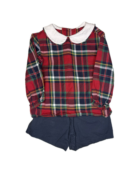 Plaid long sleeve children's top with white collar and navy shorts set on white background