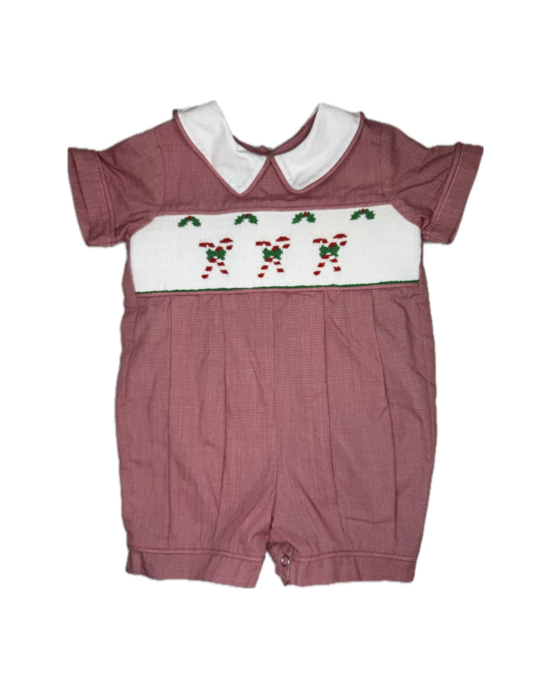 Red toddler romper with white collar and smocked candy cane design, classic children's clothing