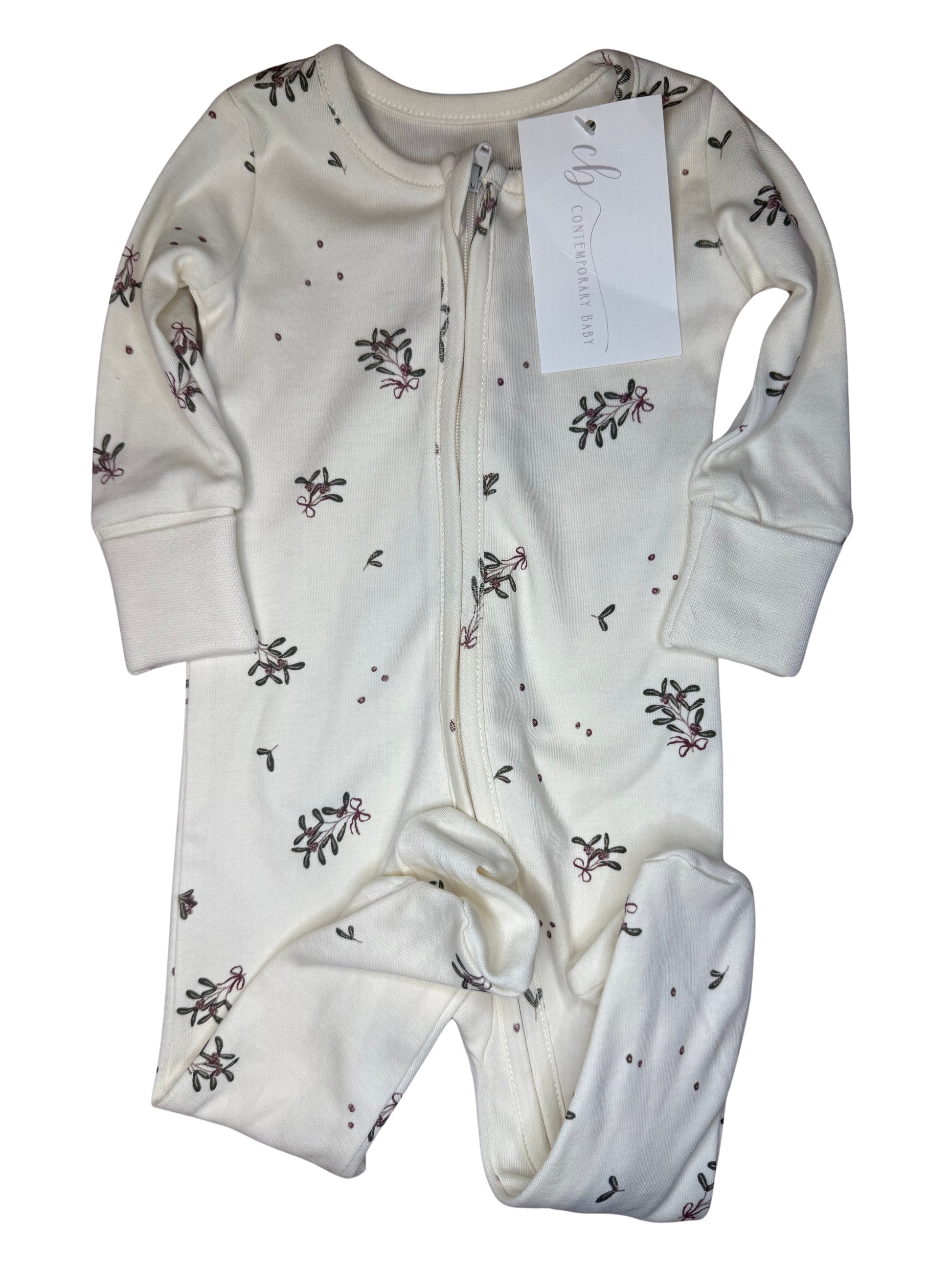 White baby footed sleeper with floral print, zipper front, and long sleeves, laid flat.